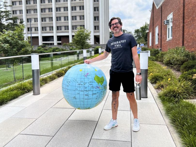 Matt Wilson with globe